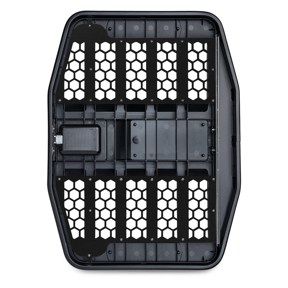 The GUNNER CHEW KIT is a black, rectangular roof rack tray with hexagonal cutouts and a central raised section, perfect for carrying GUNNER kennels or other dog gear. Shown from above on a white background.