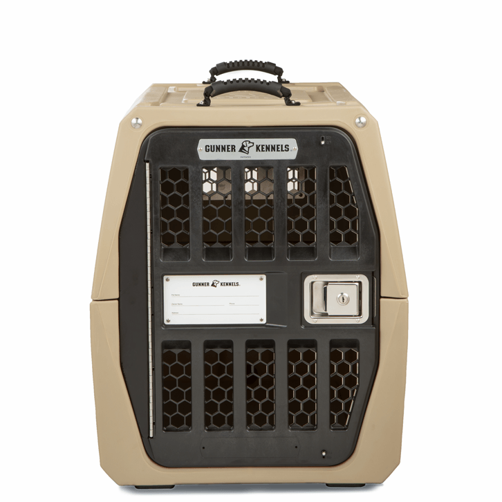A tan and black GUNNER kennel with a sturdy metal grid door, top handle, secure latch, and a GK NAME PLATE from GUNNER. Available in Small and Medium sizes for safe animal transport.