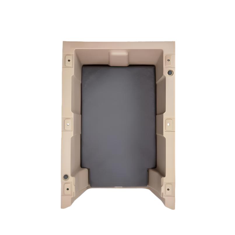 Top-down view of the GUNNER ORTHOPEDIC KENNEL BED, a rectangular tan plastic container with a cooling memory foam dog pad and dark gray padded interior, recessed sides, on a white background.