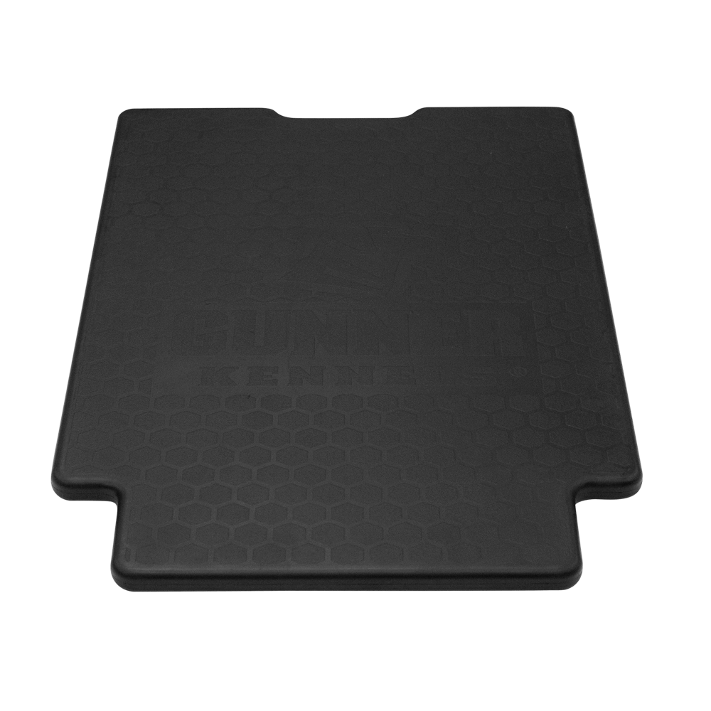 A black, rectangular PERFORMANCE PAD by GUNNER with rounded edges and a subtle hexagonal pattern. GUNNER is faintly embossed in the center, and two small notches appear on one shorter side.